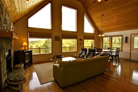 living room with window overlooking mountains