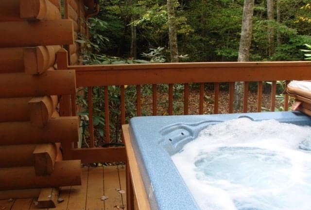Bubbling hot tub at Beary Cozy Creek cabin