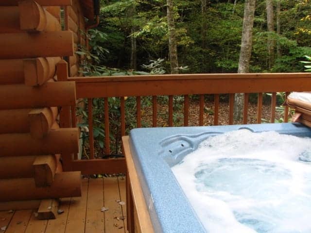 Bubbling hot tub at Beary Cozy Creek cabin