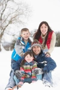 Family having fun in the snow