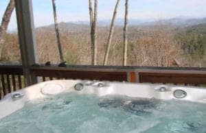 hot tub on deck of cedar heights cabin