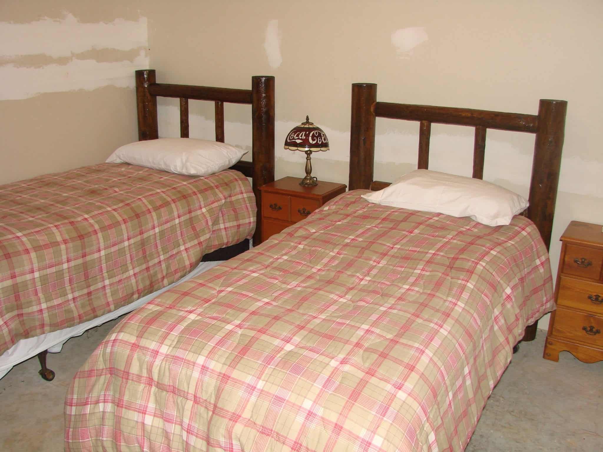 Two beds next to each other in a Murphy North Carolina rental.