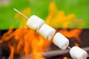 Marshmallows roasting over a fire.