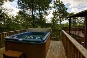 A hot tub on the deck of the Heavens Retreat cabin near Murphy NC.