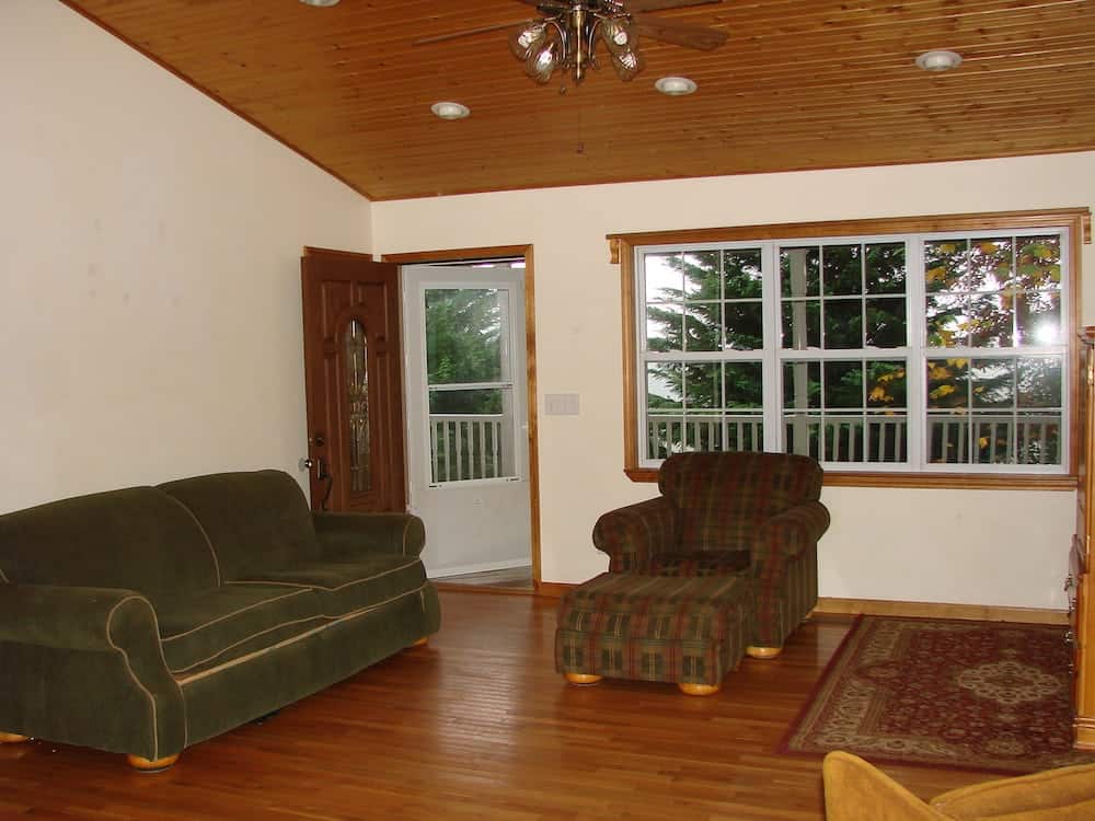 living room with wooden ceiling