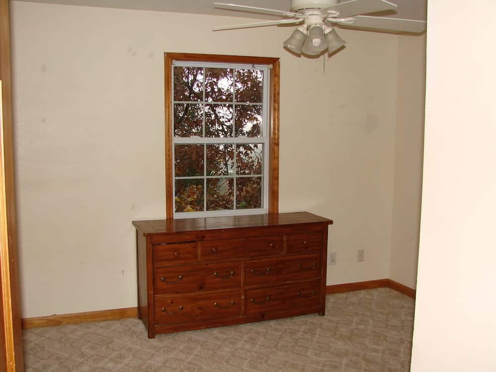 empty room with a dresser