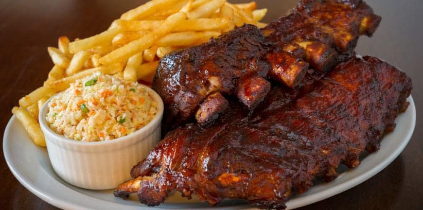 barbecue ribs with coleslaw and fries
