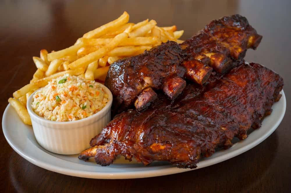 barbecue ribs with coleslaw and fries